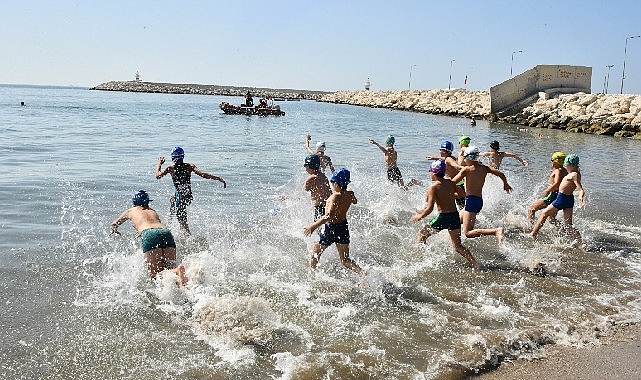 aquatlon-yarislarinda-64-sporcunun-45i-yenisehir-belediyesi-adina-yaristi.jpg